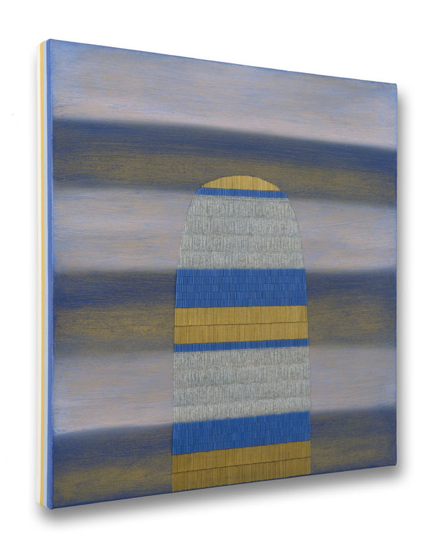 Side view of blue, yellow, and white striped painting with oblong beaded shape.