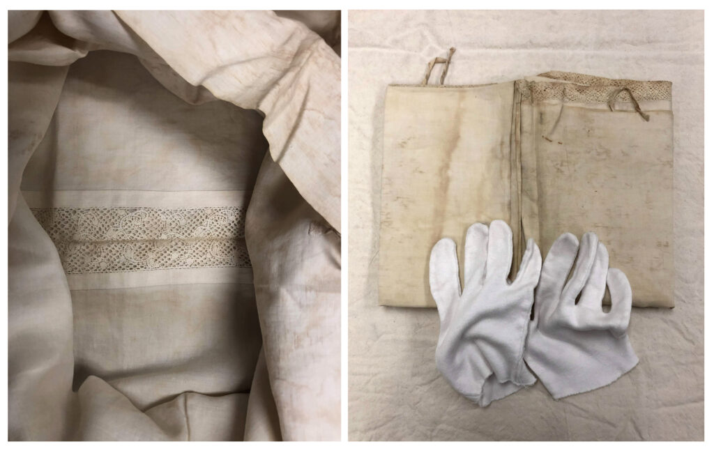 Off-white vintage textile with lace detail in center. / White gloves rest on yellowed antique textile with lace edge.