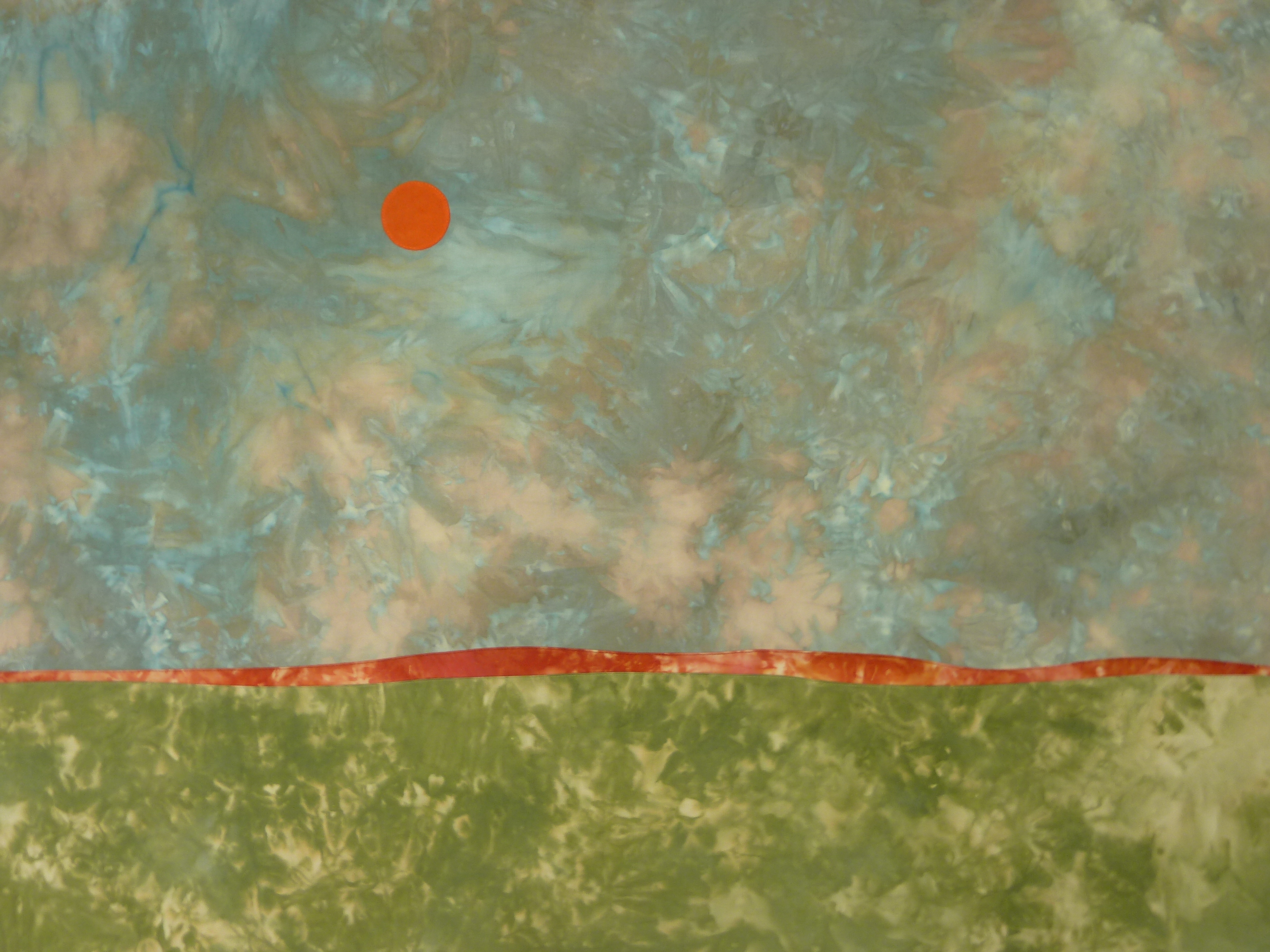 Dyed textile with blue sky, green prairie, red sun, and red strip on horizon in mottled pattern.