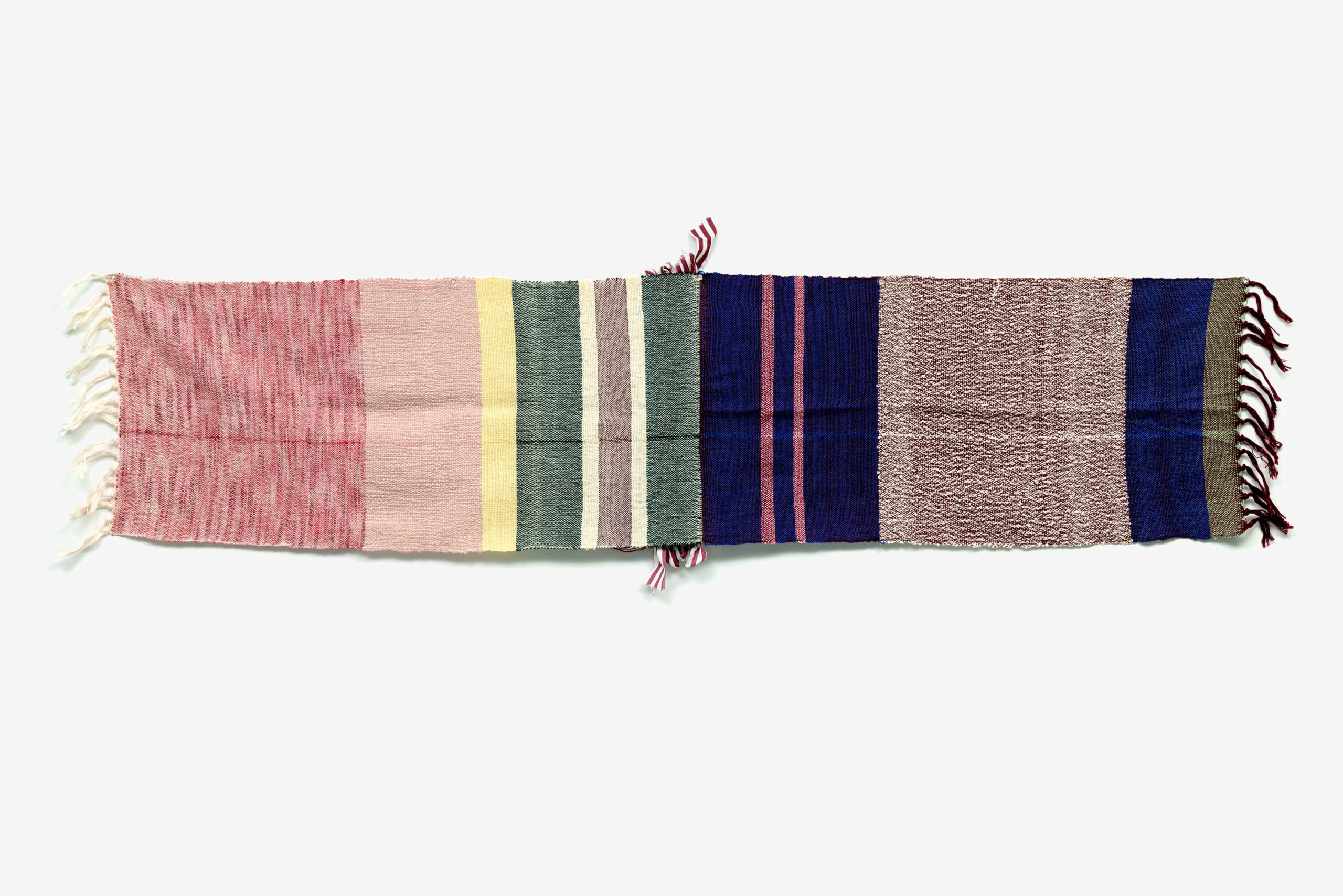 Woven cloth in pink, green, and blue stripes.