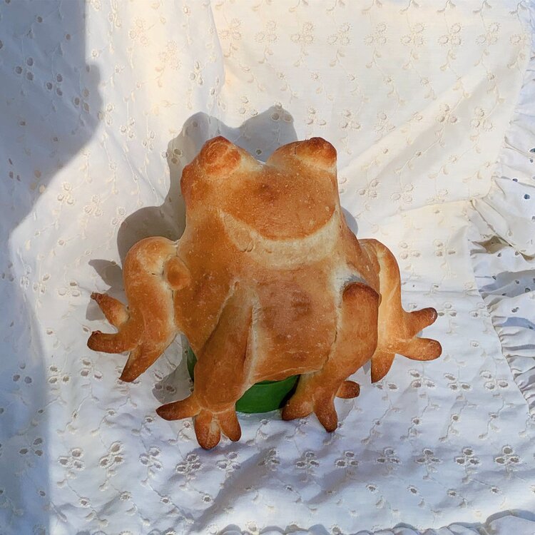 Bread in the shape of a frog.