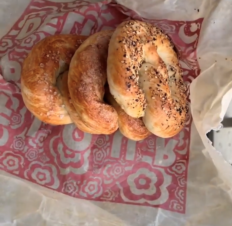 Three soft pretzels in red-printed beeswax wrapper.
