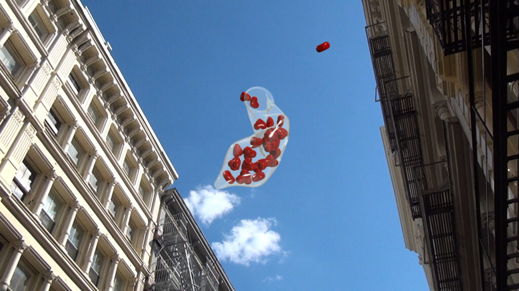 Between tall buildings an animated condom filled with red hearts floats in a blue sky