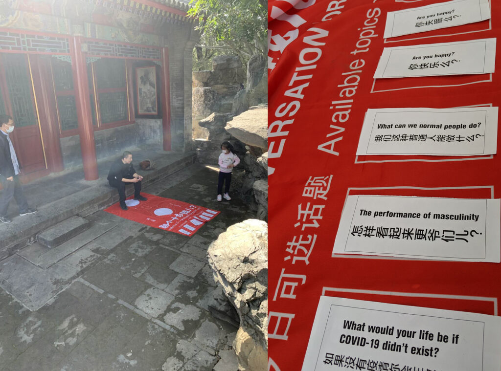 Left: Artist sits on front step of temple. Right: Red sign with questions written in English and Chinese.