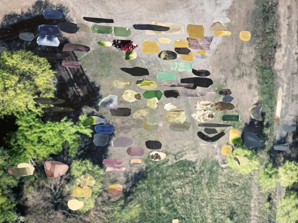Blobs of color over blurry aerial photograph