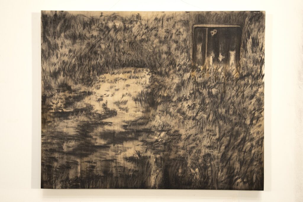 Charcoal drawing on wood panel of dark doors built into grassy hillside, with pond surrounded by grass